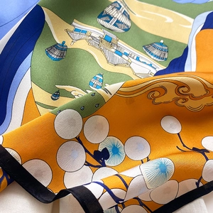 Macro shot of silk scarf showing vibrant floral patterns and premium glossy texture