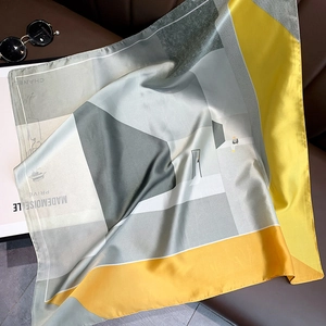 Elegant grey and yellow geometric silk scarf with modern illustrative patterns