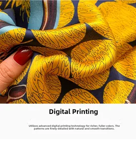 Detail showing the digital print silk scarf with vibrant blue and yellow textures