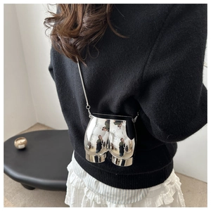 Modern metallic silver mini crossbody bag featuring a unique creative hip-shaped design