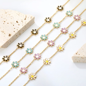 Daisy enamel charm bracelets in assorted colors with delicate gold stainless steel chains