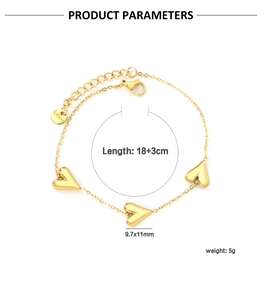 Detail view of 18K gold plated stainless steel heart charm bracelet with size parameters