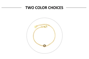 Detail of gold bead chain bracelet with black and white enamel flower charms and S.STEEL stamp