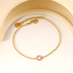 Golden stainless steel bead chain bracelet with purple enamel flower pendant and lobster clasp