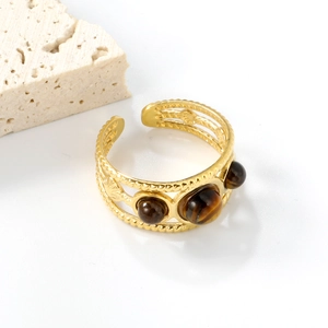 Bohemian gold stainless steel open ring featuring three brown tiger eye stones