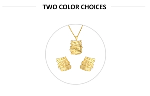Detailed view of gold jewelry set with multi-layer wavy bark texture and polished finish