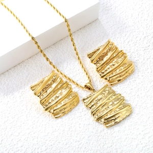 Golden bark texture jewelry set with rectangular pendant necklace and matching earrings