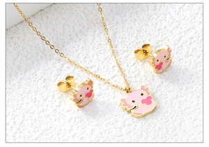 Detailed view of pink axolotl jewelry set with golden stainless steel necklace and earrings