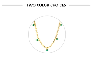 Detail of 18K gold stainless steel bead chain with five round emerald green zircon pendants