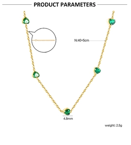 Detail view showing heart-shaped emerald zircon necklace with 40+5cm gold chain