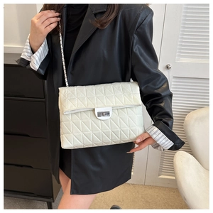 Quilted cream large capacity crossbody bag with silver chain and twist lock for women