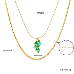 Double-layered gold necklace with green zircon leaf pendant and flat snake chain set