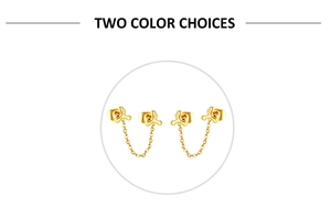 Detail of gold chain stud earrings with double star studs and delicate linked tassel chain