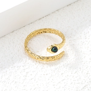 Luxury 18K gold plated stainless steel snake ring with green stone on white background