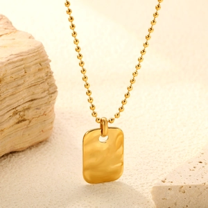 Golden tree of life necklace with hammered rectangular pendant on a ball chain