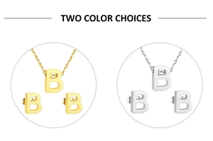 Detail view of the letter B necklace and stud earrings set in gold and silver finishes