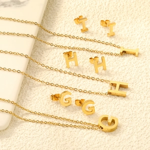 Golden stainless steel necklace and stud earrings set with G, H, I alphabet pendants