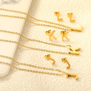 Golden stainless steel initial necklace and stud earring sets for letters J, K, and L