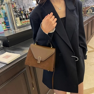Brown matte spliced Kelly style handbag with elegant gold hardware for modern women