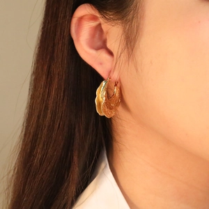 French luxury maple leaf pleated earrings with 18k gold plating and metallic texture