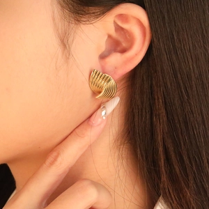 Golden 18K gold plated stainless steel curved fan stud earrings with vertical texture