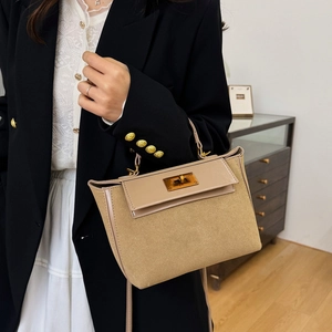 Retro khaki trapezoid handbag with gold twist lock and crossbody strap for women