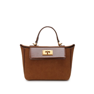 Vintage brown suede handbag with a smooth leather flap and a golden metal clasp