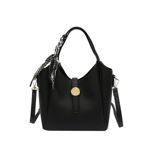 Chic black lychee grain leather bucket bag with gold metal lock and silk scarf detail