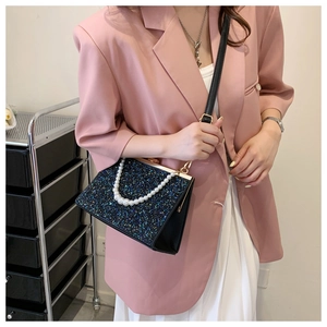 Fashionable trapezoid handbag with sparkling sequins and elegant pearl handle strap