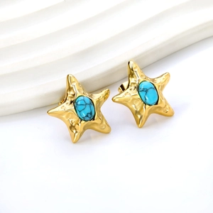 Golden starfish stud earrings featuring turquoise stones with a textured metal finish
