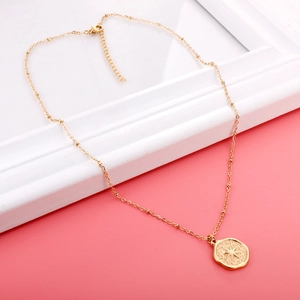 Vintage gold stainless steel coin necklace with starburst pendant on beaded chain