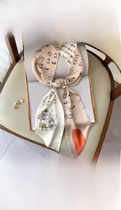 Detail of 15x150cm faux silk neckerchief with cute cartoon cat print on cream background