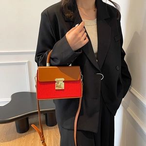 Retro contrast color box handbag with red pleated texture and brown leather flap for women