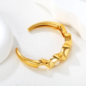 Minimalist 18K gold stainless steel open bangle with irregular wavy satin design