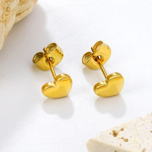 Minimalist heart-shaped stud earrings in polished gold stainless steel finish
