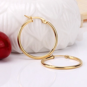 Polished gold stainless steel 2mm hoop earrings with secure click-top closure for women