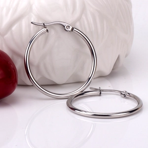 Minimalist silver stainless steel hoop earrings with high polish finish for women