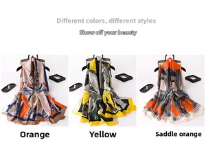 Close-up of silk-textured scarves featuring vintage equestrian prints in vibrant orange and yellow
