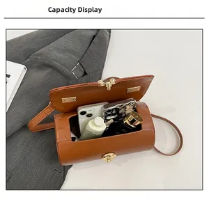 Top view showing the internal capacity of the vintage brown cylindrical crossbody bag