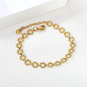 Elegant gold stainless steel bead chain bracelet featuring heart-shaped white shell accents