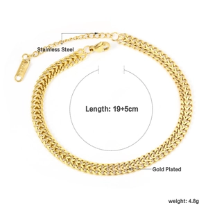 Detail of 18K gold plated stainless steel double chain bracelet with K18 stamp and lobster clasp