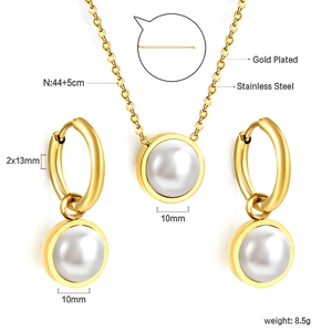 Detail view of gold-plated stainless steel jewelry set with measurements and pearl dimensions