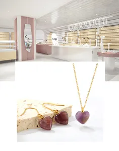 Detail of purple heart-shaped stone pendant and earrings set with gold chains