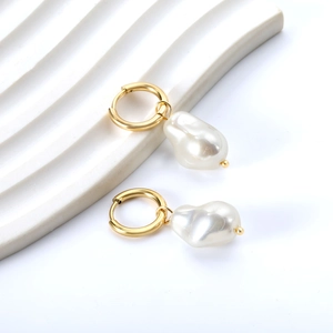 Elegant gold circular stud earrings featuring natural white baroque pearl drops on stone