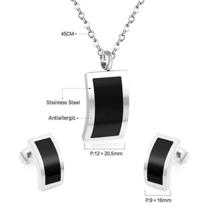 Minimalist stainless steel jewelry set with black shell rectangle pendants on white background