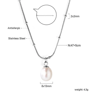 Detailed view of freshwater pearl pendant on stainless steel chain with lobster clasp