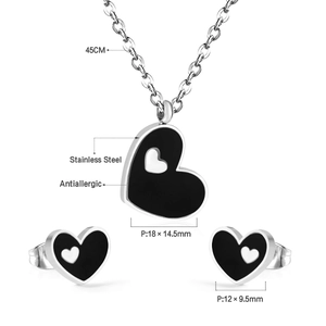 Detail view of heart jewelry set with 45cm necklace and earrings in stainless steel