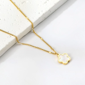 Elegante collana a fiore dorata con pendente in madreperla su base in pietra bianca