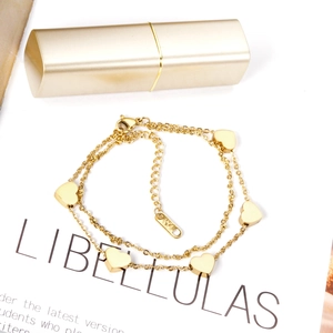 Detail of 14K gold plated double-layer heart bracelet showing K14 hallmark and lobster clasp