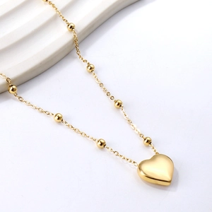 Collier à billes en acier inoxydable plaqué or 18 carats avec pendentif en cœur